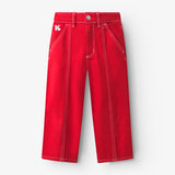 Pantalon enfant en twill rouge, forme légèrement ballon avec poches italiennes
