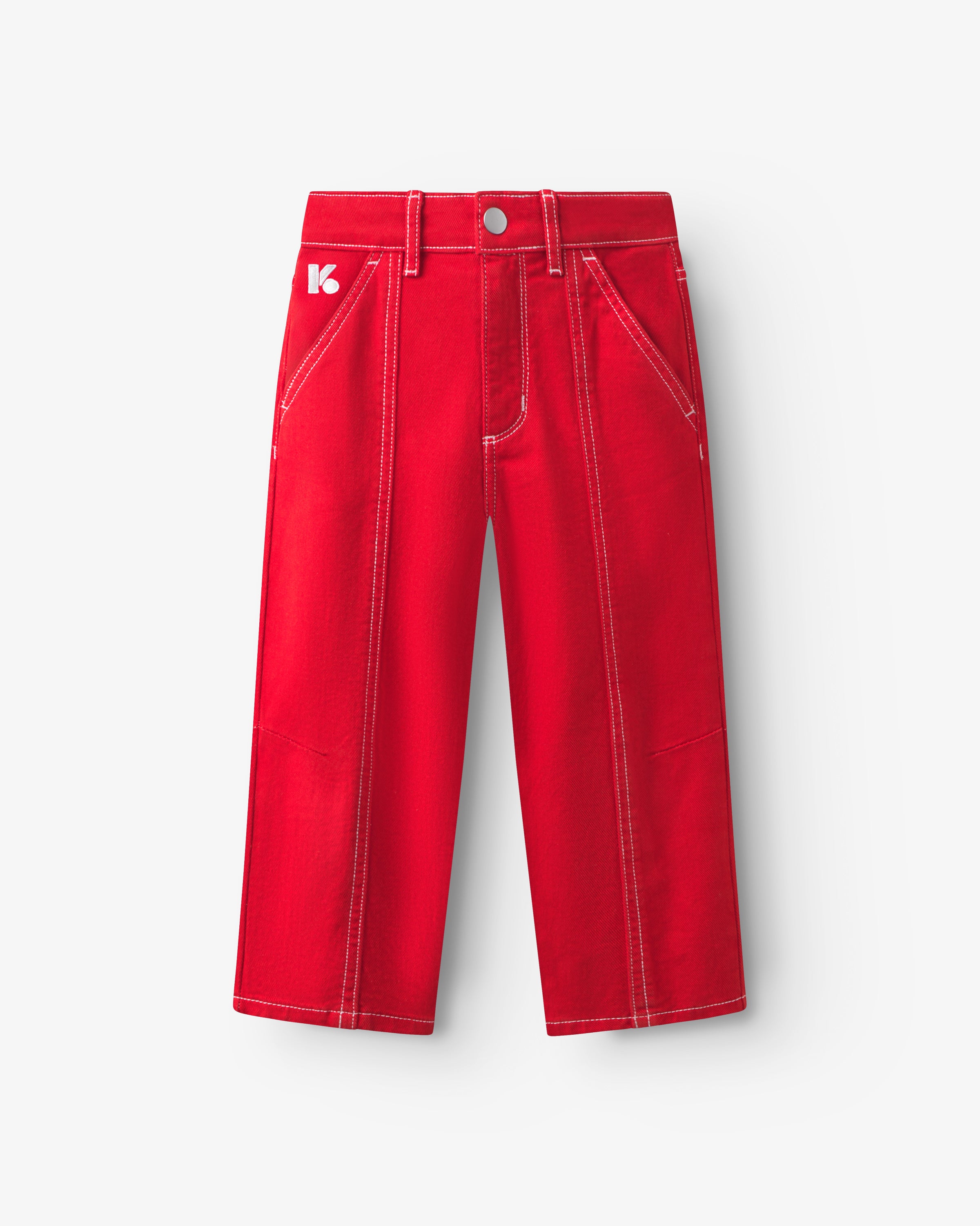 Pantalon enfant en twill rouge, forme légèrement ballon avec poches italiennes